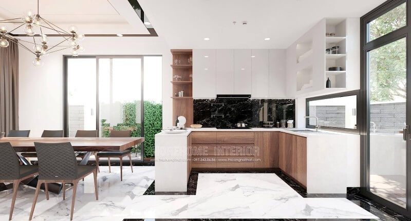 Sự phối hợp hài hòa giữa 2 tone màu chủ đạo trắng và nâu trầm mang đến một không gian nấu nướng tinh tế và không kém phần sang trọng.